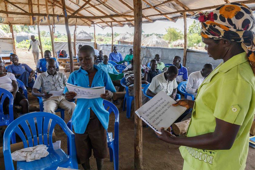 Neema A’dilo leads a literacy workshop in the Bidi Bidi<br />
                                refugee settlement.